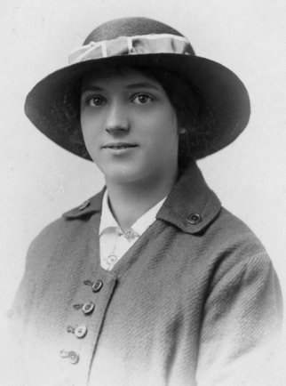 Woman in domed crown hat